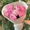 Букет з 9 рожевих півоній 